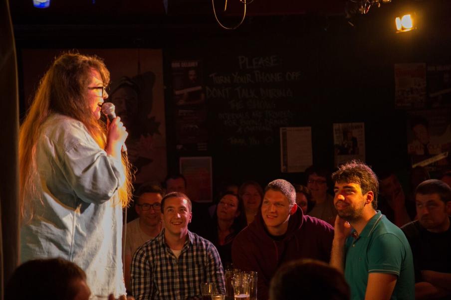 Comedian on stage at the Stand Comedy Club.