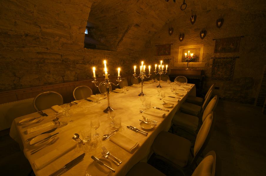 Winton Castle cellar set for an intimate candle-lit dinner