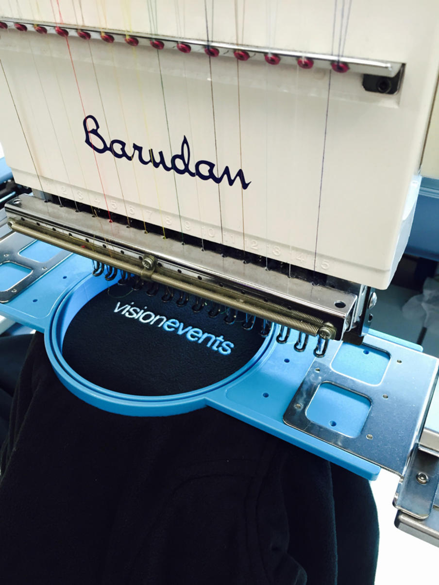 Clothing embroidered at our in-house production centre.