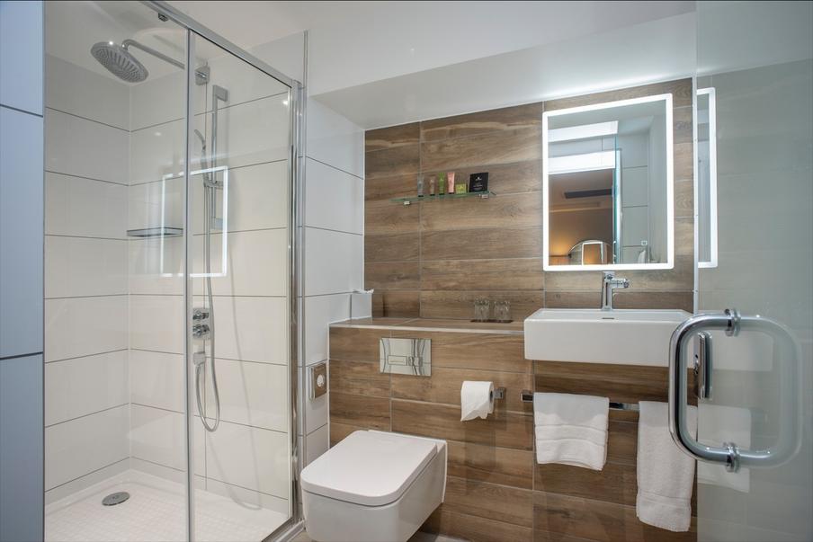 Beautiful new bathrooms with large shower and excellent lighting.