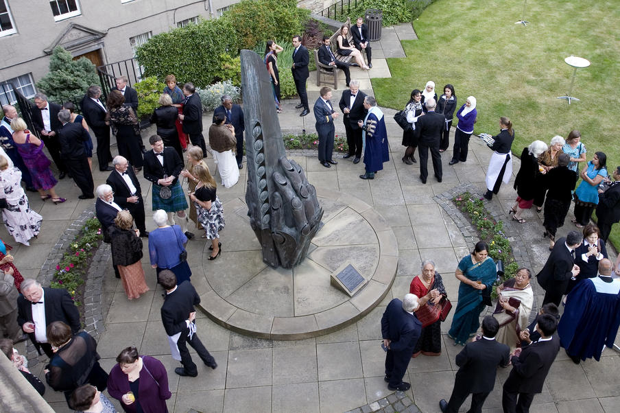 Event attendees enjoy the gardens.