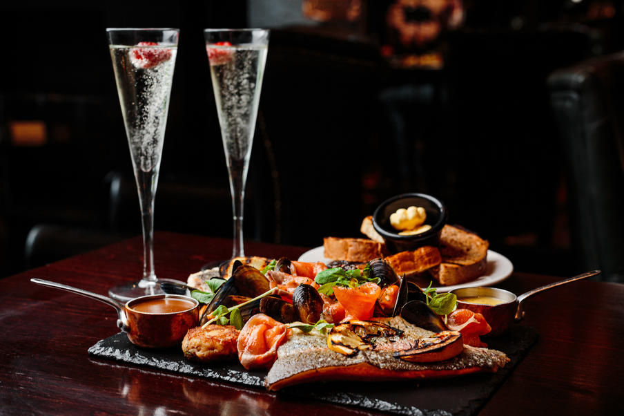Relax with one of our Sharing Seafood Platters. Enjoy Mussels, King Prawns, Market Fish, Crab Cakes, Smoked Salmon, Crayfish, Bearnaise, Bisque Sauce & Crusty Bread, all accompanied by a glass of Champagne. 