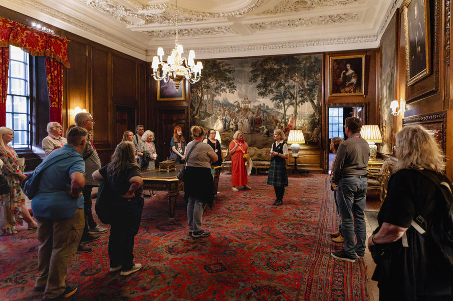 A group enjoying a private tour of the Palace.
